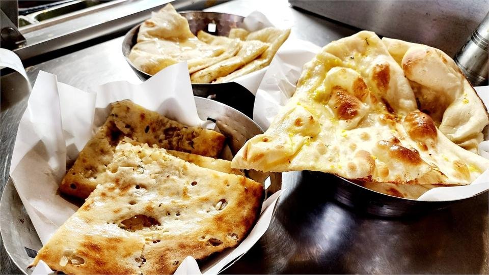 A basket of fresh naan